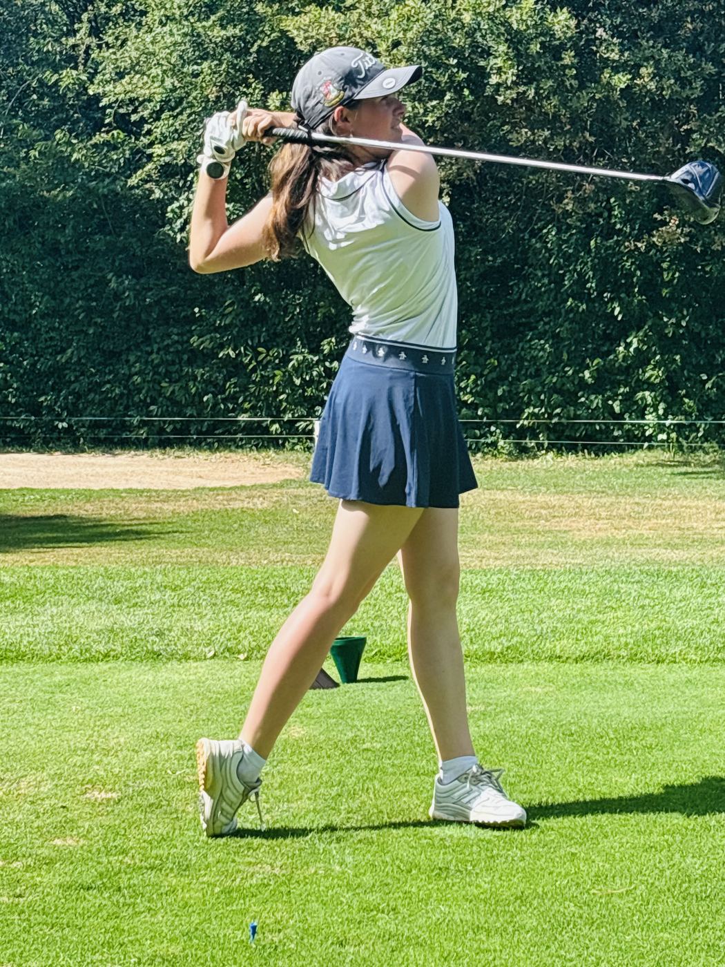 Antonia Burchert at the finish of a driver swing from the tee.
